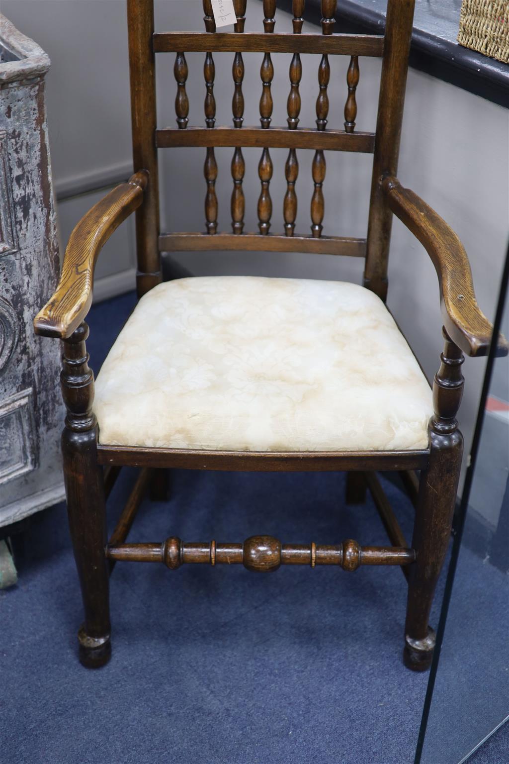 A 19th century ash Lancashire spindle back elbow chair